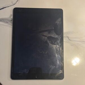 Apple Black Tablet with Reflective Screen and Rounded Corners